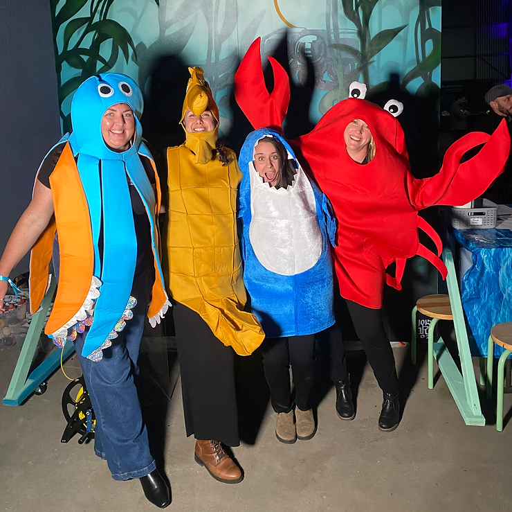 ESP Advisors team wearing ocean creature costumes